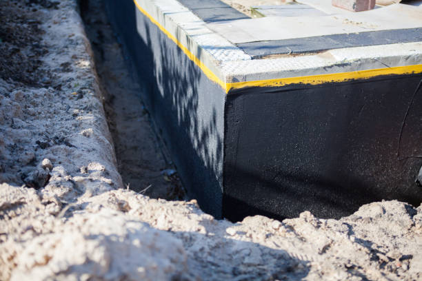 Professional Waterproofing technician working in Malvern, AL